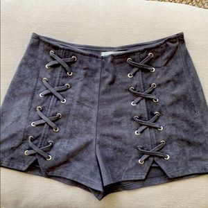 Gray faux suede shorts in a size M